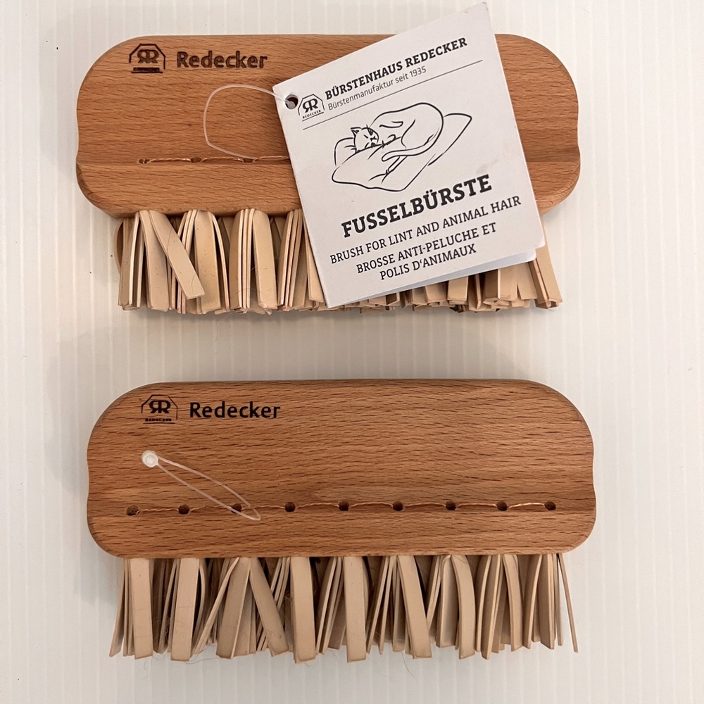 Pair of Redecker lint Brushes